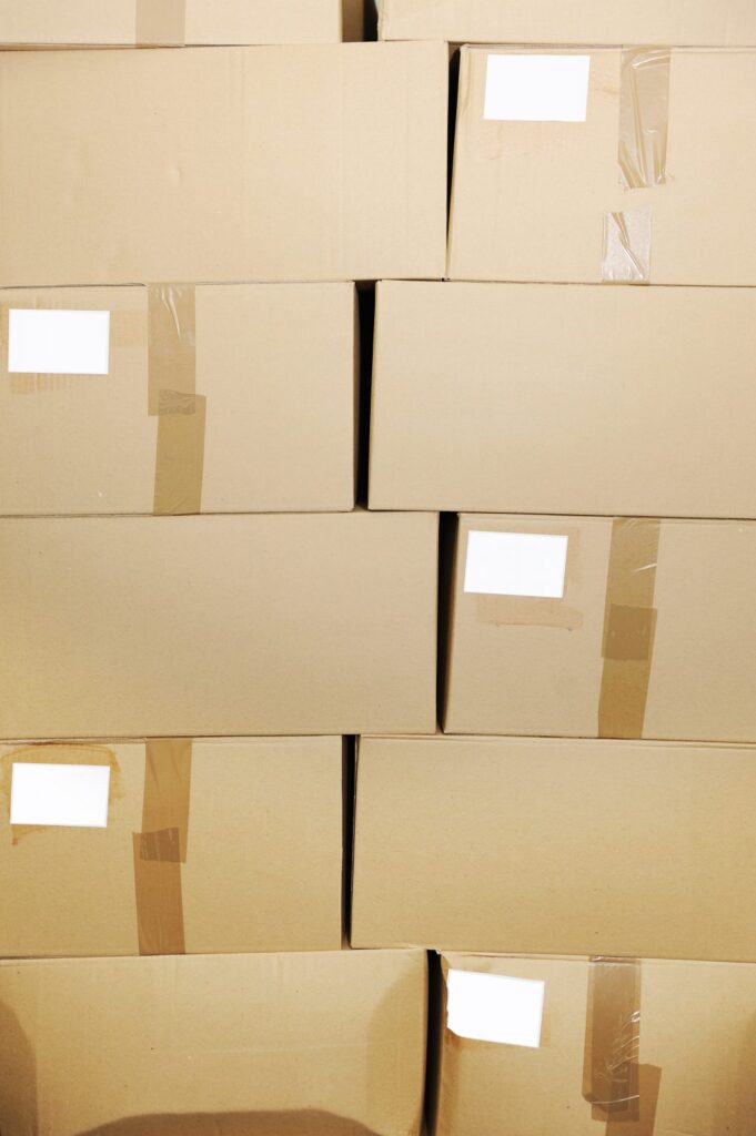 piles of cardboard moving boxes