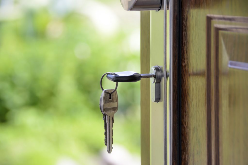 key in the door of a new house